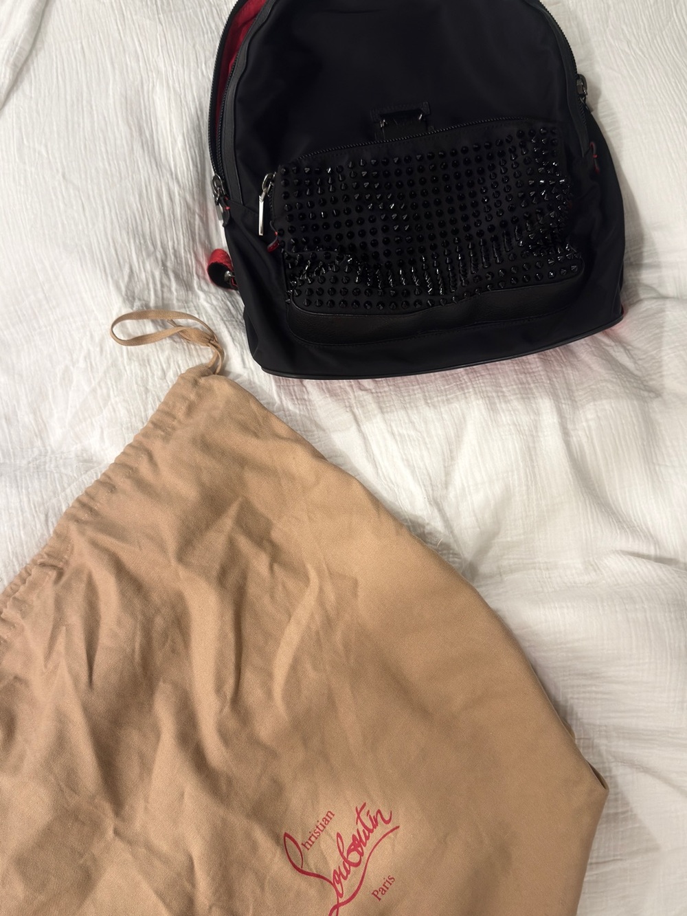 Christian Louboutin Black Backpack with Red Trim and Studded Front Pocket